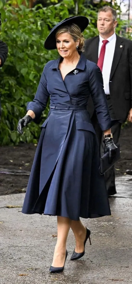 Estilo bajo la lluvia de la reina M&aacute;xima