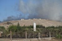 AHORA| Persisten labores de extinción del incendio en el Vertedero San Javier