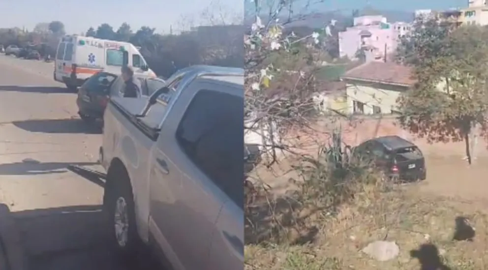 Choque múltiple en Avenida Juan XXIII: un automóvil terminó dentro del canal