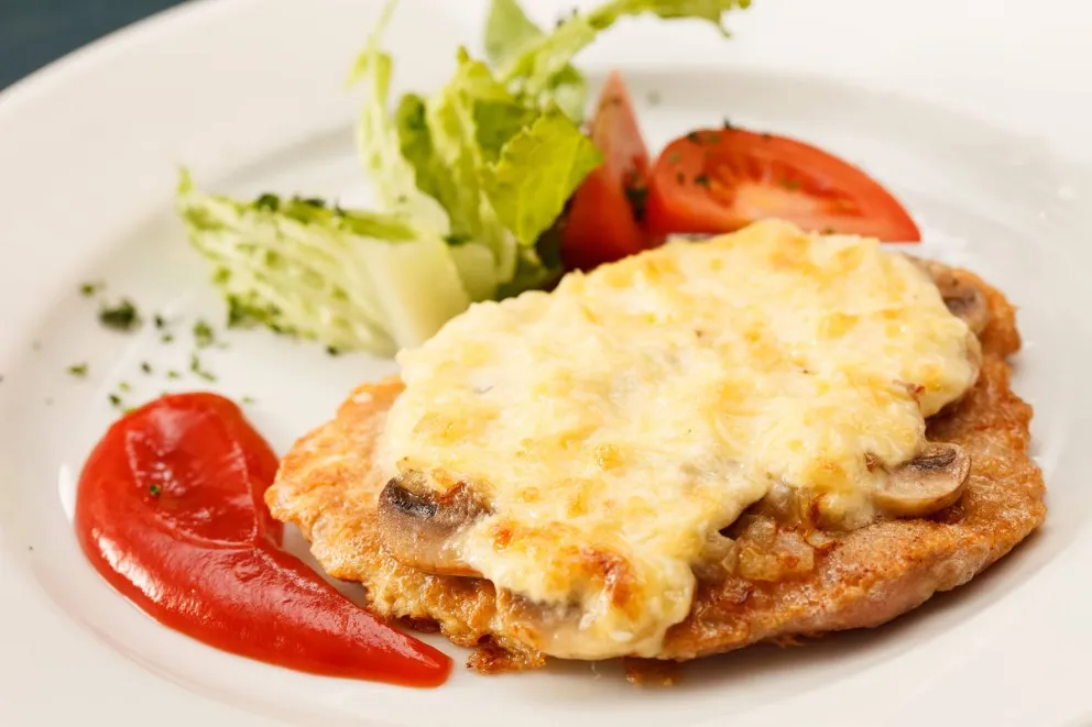 La irresistible Milanesa de tres quesos: así se prepara esta delicia para compartir en familia